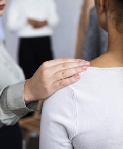 woman-consoling-person-group-therapy-session